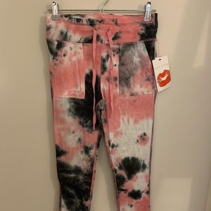 Hot Kiss pink, black, and white tye-dye leggings